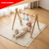 Hariv puidust mängukaar Baby Gym Kruzzel 0+, 4 riputusrõngast, 64 x 43 x 52 cm
