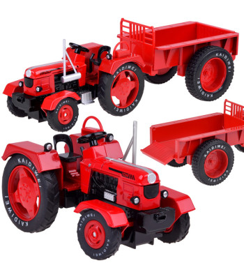 Punane metallist traktor haagisega