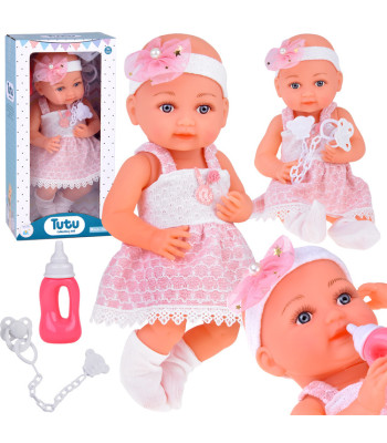 Kummist beebinukk roosas kleidis pudel ja lutt ZA5235